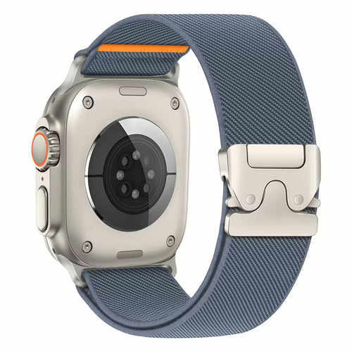 Correa deportiva The Strap Society México para Apple Watch en nylon gris con cierre magnético metálico y detalle naranja